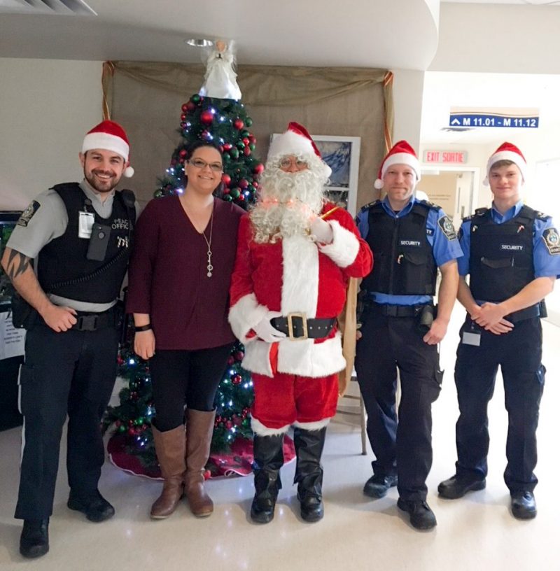 Security Guards Posing with Santa