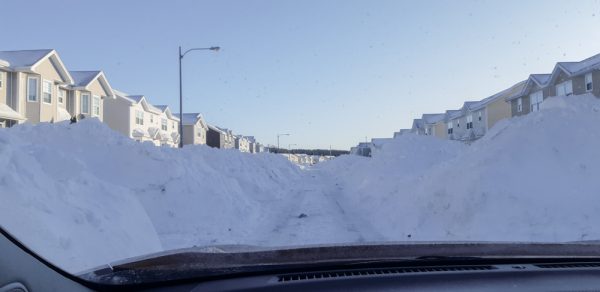 Huge Snow Piles in Residential Area