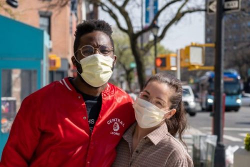 two people wearing face masks