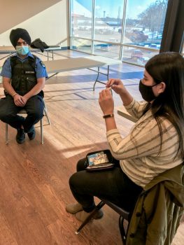 Security Officer Watching Naloxone Training